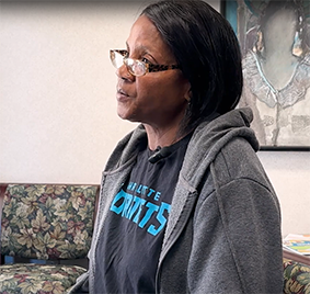 Saundra telling her story in front of the camera.