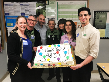 Publix employees with cake