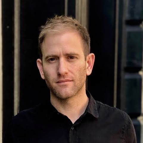 Headshot of Brian Goldstone