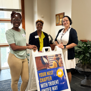 Photo of Angie Williams, Natasha Chatman and Karen Chew outside of the Charleston Center for Strong Families in the CCPL Main Branch