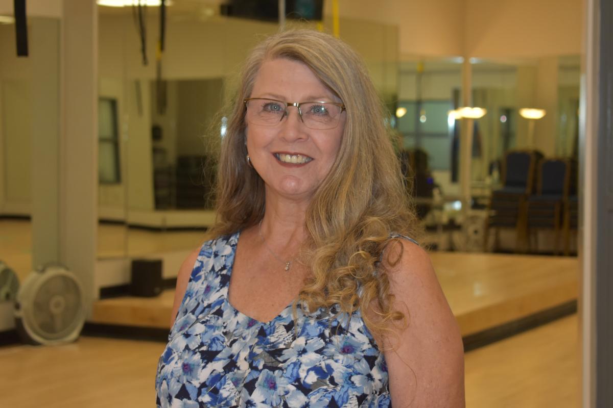 Photo of Mary Nixon inside of gym classroom