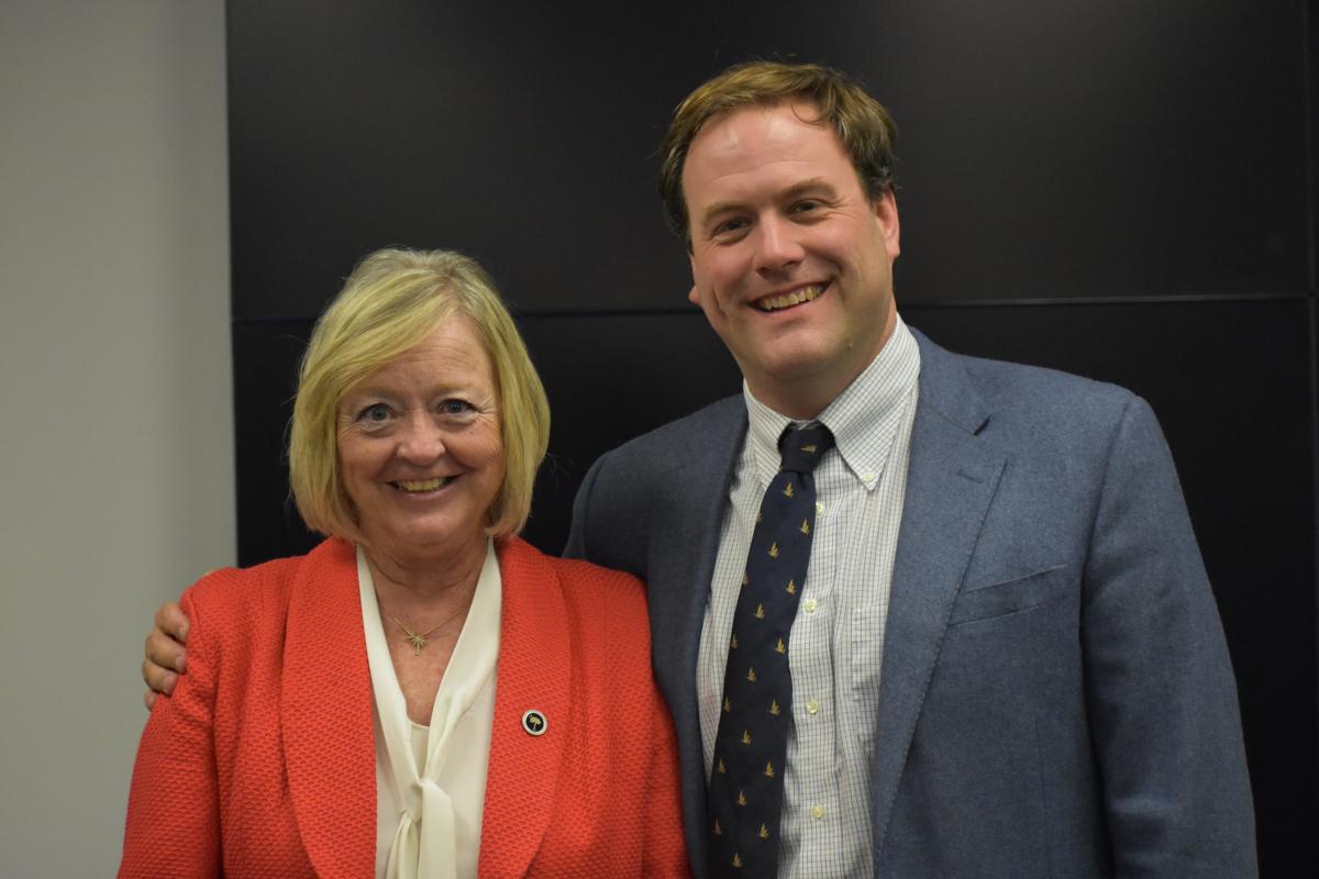 Rep. Lin Bennett and Rep. William Cogswell smiling in a picture together