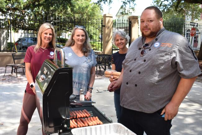 pics of volunteers grilling