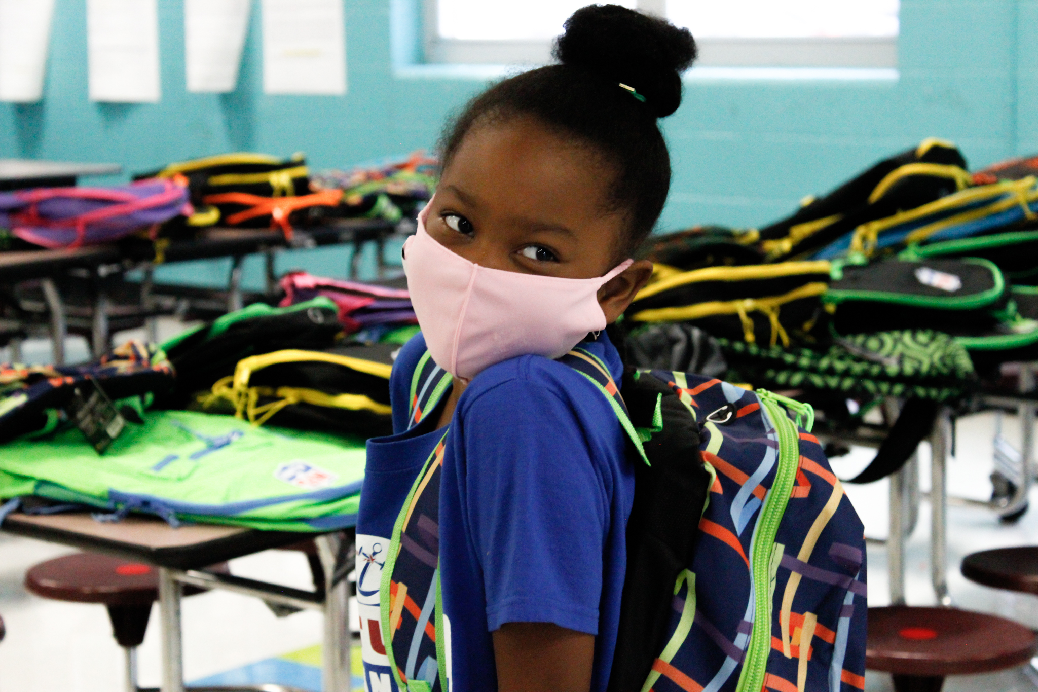 aaliyah smalls with donated backpack