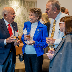Tocqueville Society members mingle at spring event