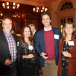 Tocqueville Society members mingle at winter event