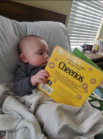 baby reading book