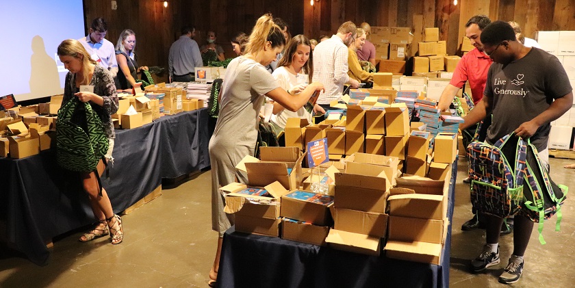 pics of volunteers filling boxes