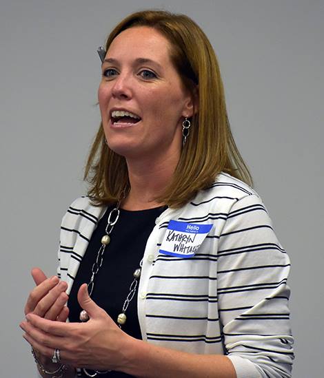 “Board Chair Kathryn Whitaker speaks.”