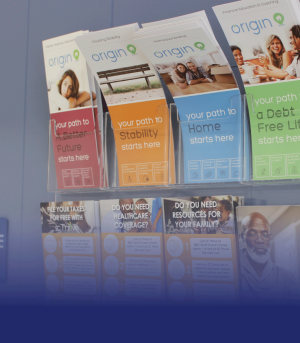 Pamphlets from the RCCs sit on the wall as resources for the community.