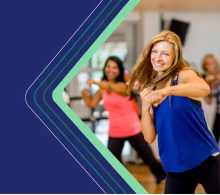 photo of a woman working out and smiling