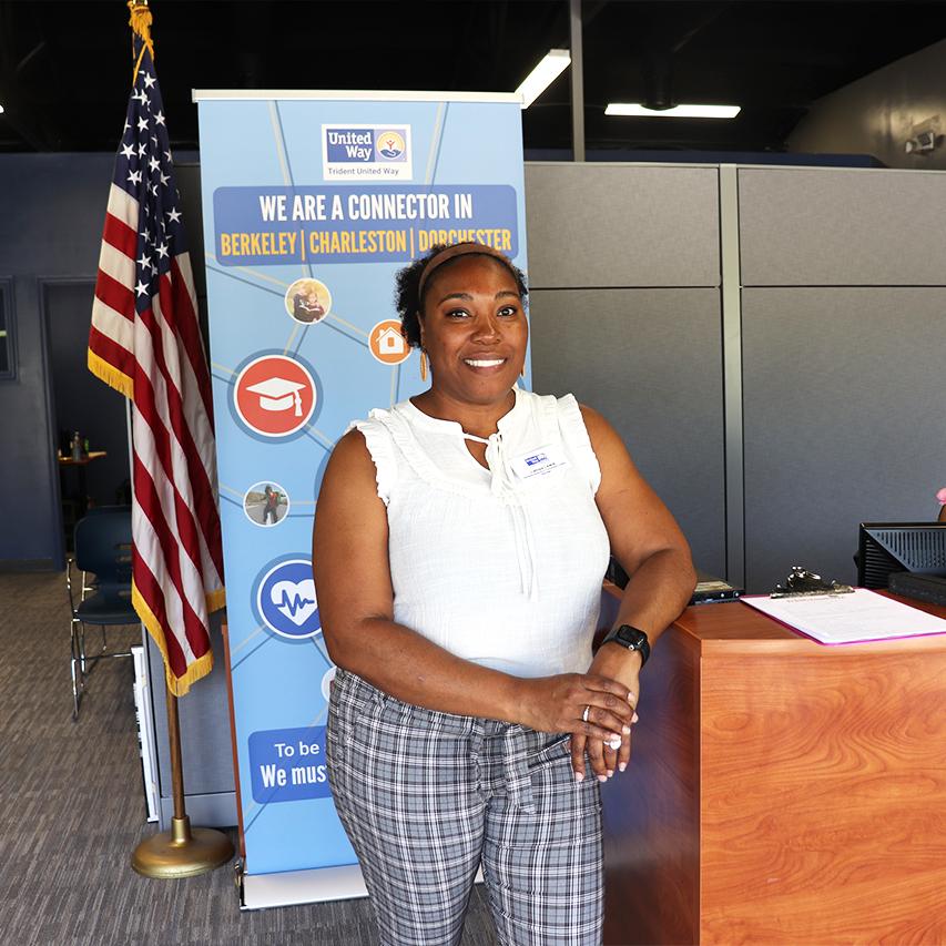 Photo of Latoya Lewis standing at the entrance of the Berkeley Resource Connection Center.