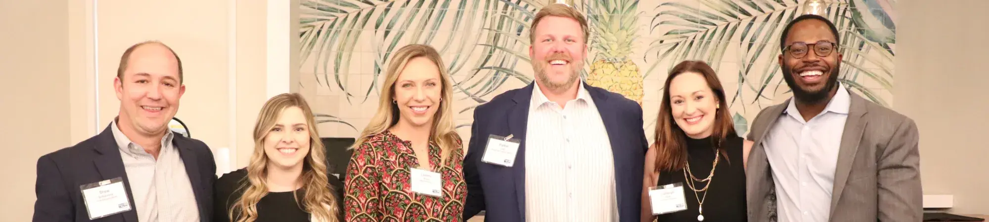 YLU Steering Committee members standing next to each other and smiling at camera